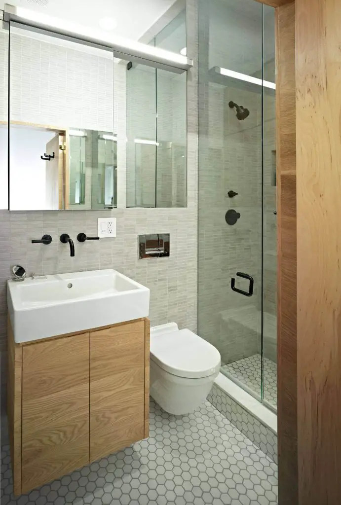 Inspiration for a contemporary bathroom remodel in New York with an integrated sink.