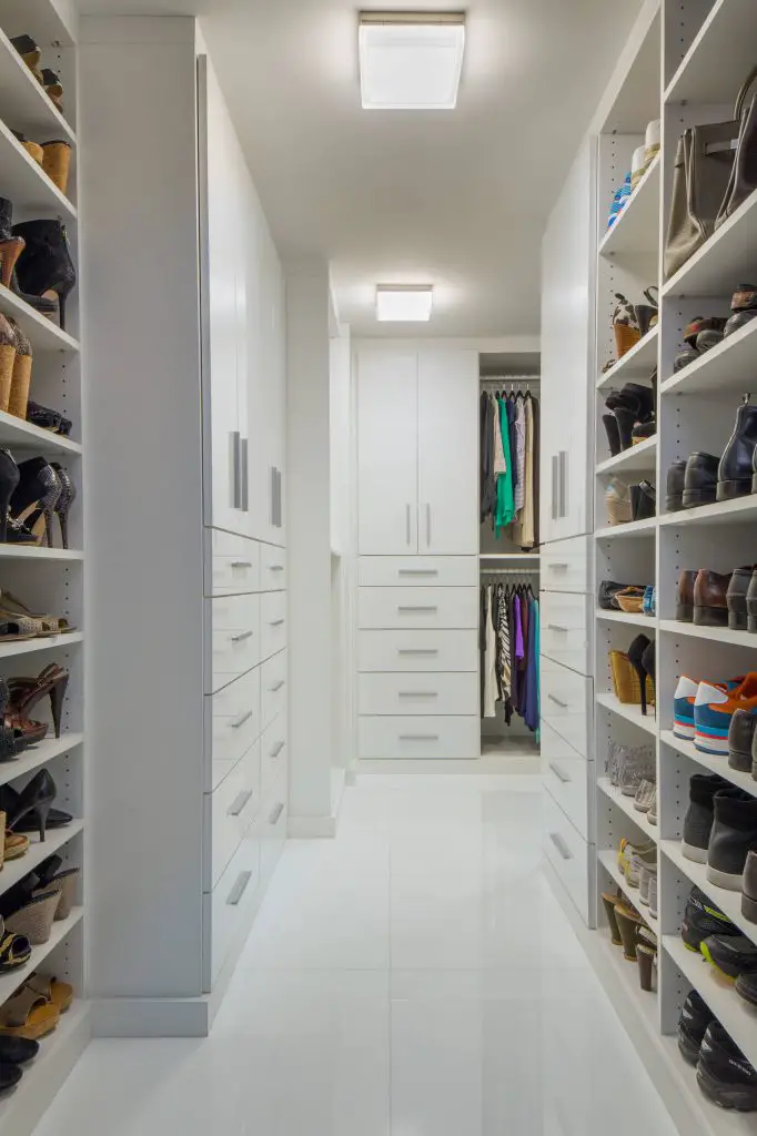 Most popular closet (9) This all-white closet shows us how lots of shelves and plenty of drawers and cabinets make for a slick and organized closet space. No nook or cranny goes to waste.