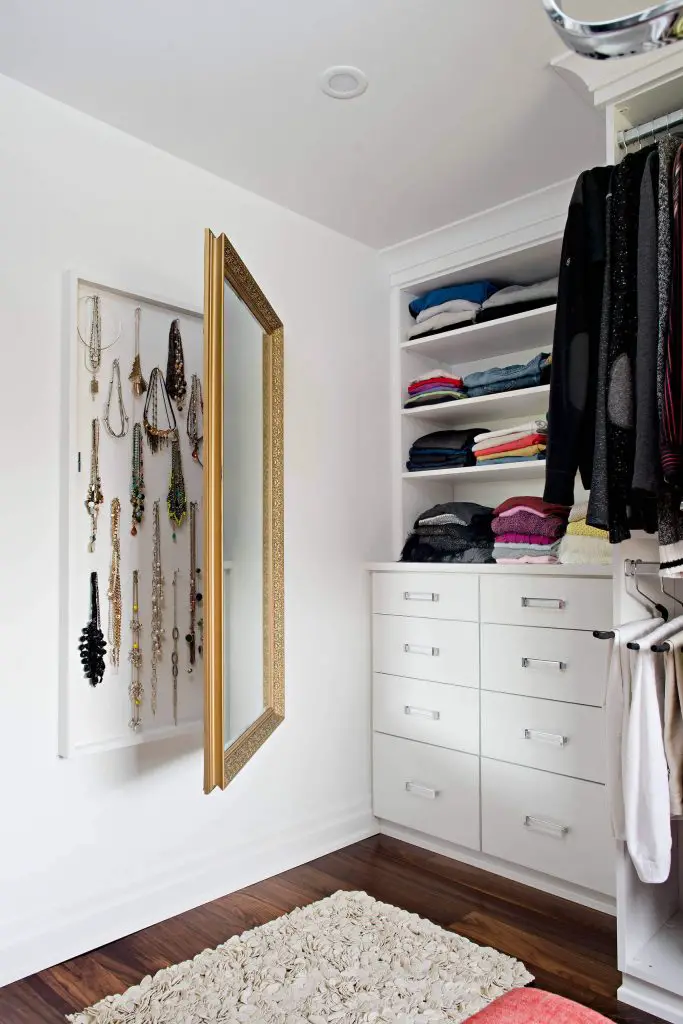 Stow your jewelry behind a mirror
