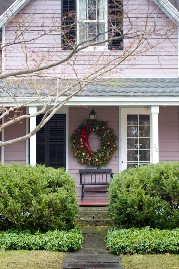 If you like an oversize wreath that is too big for your door, find a spot nearby.