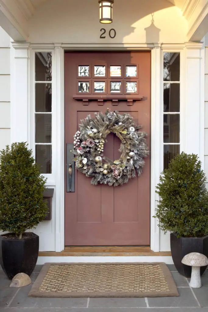 Silver and gold elements sparkle on this wreath.