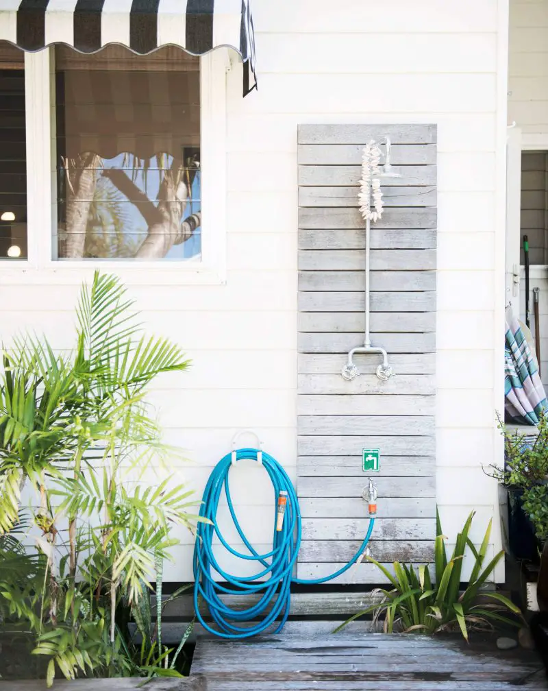The shower outside this beachy house in Sydney designed by Jason Grant