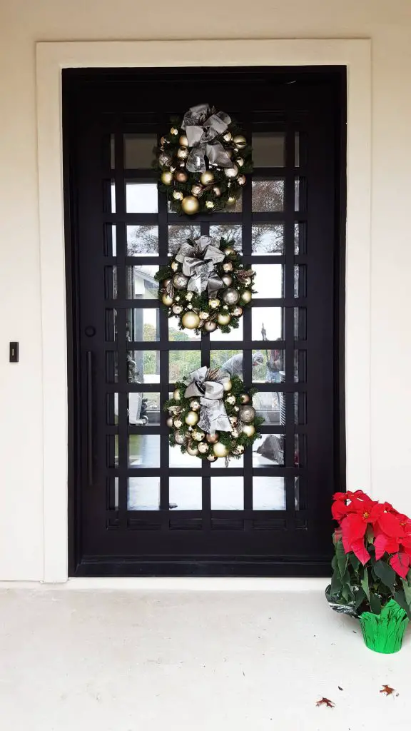 This large door is doing triple duty for the holidays.